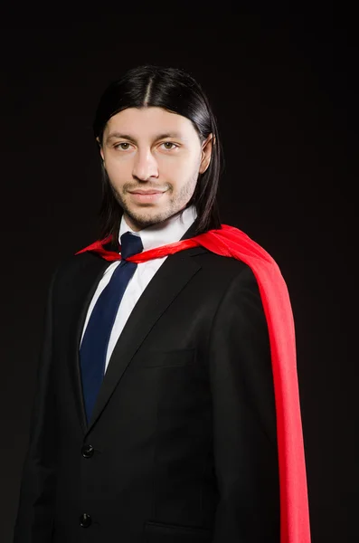 Superman concept with man in red cover — Stock Photo, Image