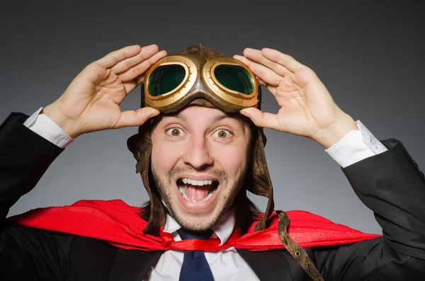 Superman concept with man in red cover — Stock Photo, Image