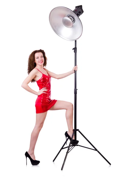 Woman in red dress posing in the studio — Stock Photo, Image