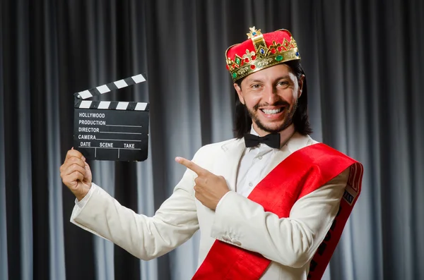 King with movie board in funny concept — Stock Photo, Image