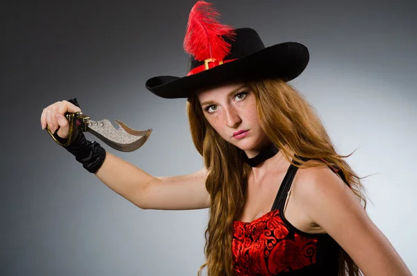 Woman pirate with sharp weapon — Stock Photo, Image