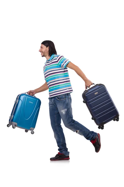 Young man travelling with suitcases isolated on white — Stock Photo, Image