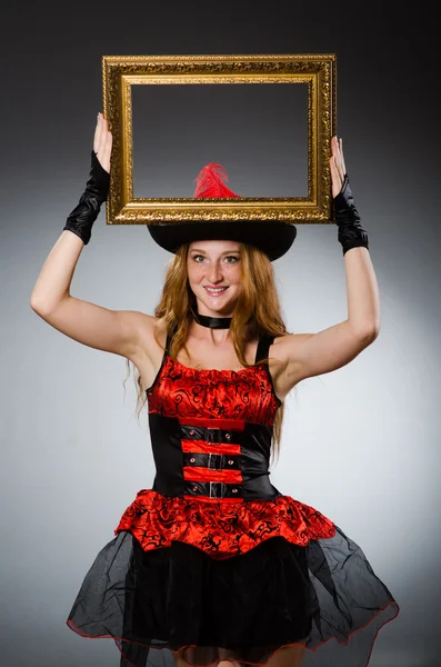 Woman pirate with picture frame — Stock Photo, Image