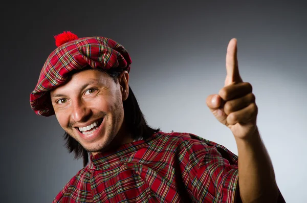 Funny scotsman in traditional clothing — Stock Photo, Image