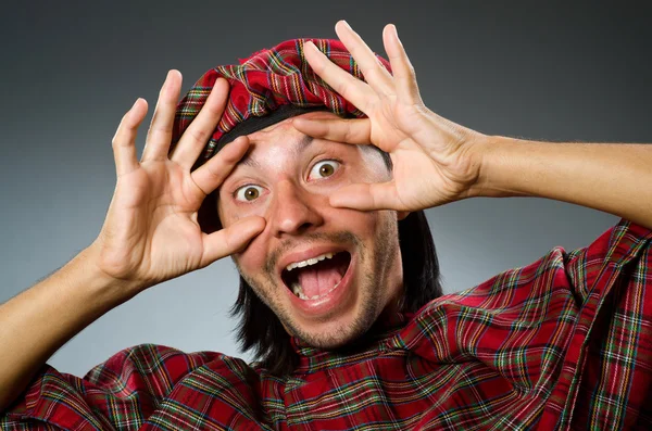 Funny scotsman in traditional clothing — Stock Photo, Image