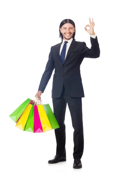 Homem com sacos de compras isolados em branco — Fotografia de Stock