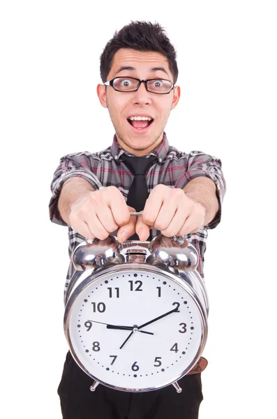 Man met klok probeert te voldoen aan de deadline geïsoleerd op wit — Stockfoto