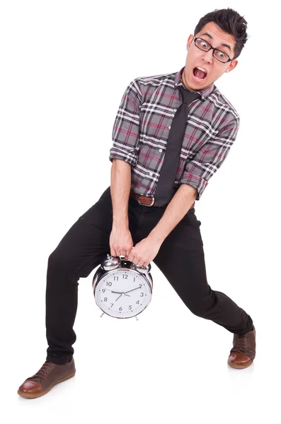 Człowiek z zegarem próbuje dotrzymać terminu odizolowany na biało — Zdjęcie stockowe