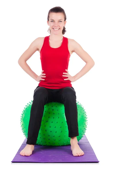 Young woman exercising with swiss ball — Stock Photo, Image