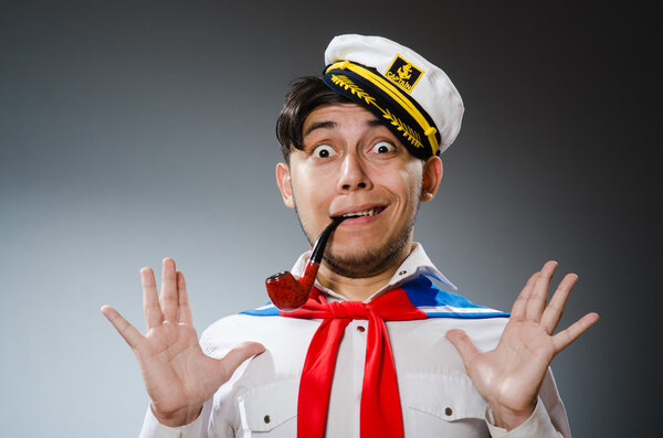 Funny captain sailor wearing hat