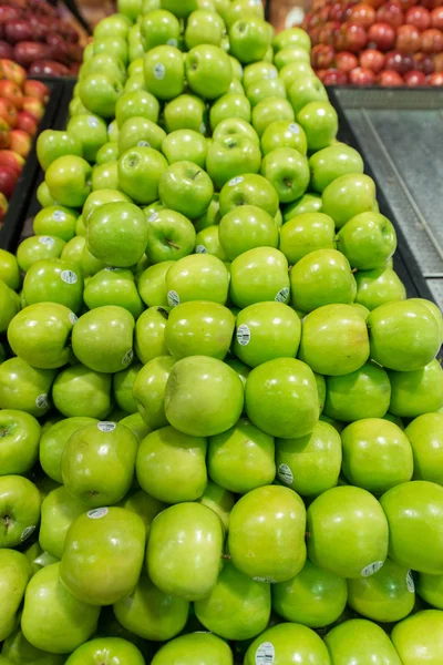 Apple stall in big supermarket — Stock Photo, Image