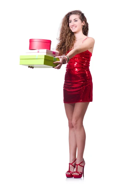 Mujer en vestido rojo con regalos de Navidad — Foto de Stock