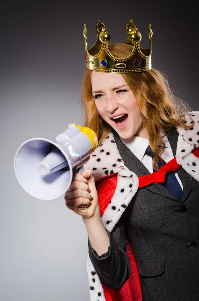 Queen businessman with loudspeaker in funny concept — Stock Photo, Image