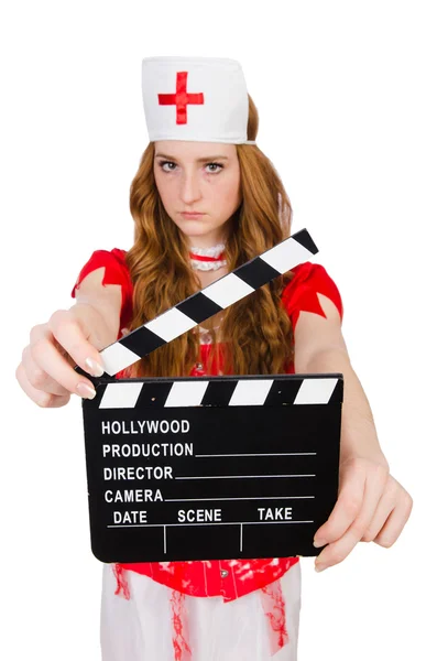 Woman doctor in bloody uniform with movie clapperboard — Stock Photo, Image