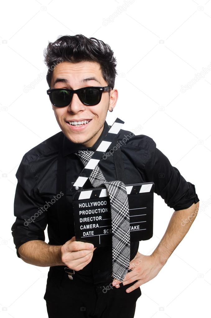 Man with movie clapperboard and hat