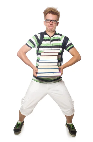 Estudante engraçado com pilha de livros — Fotografia de Stock