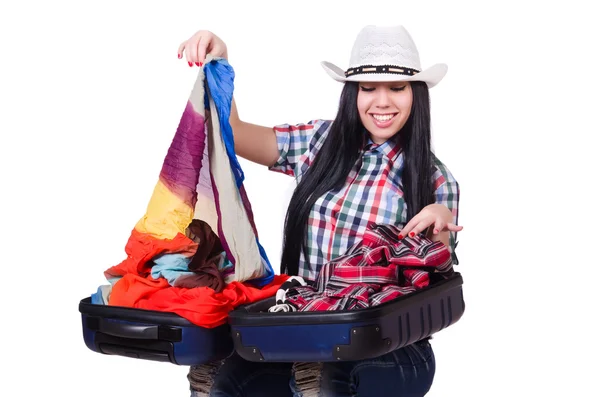 Frau versucht, zu viel isoliert auf Weiß zu packen — Stockfoto