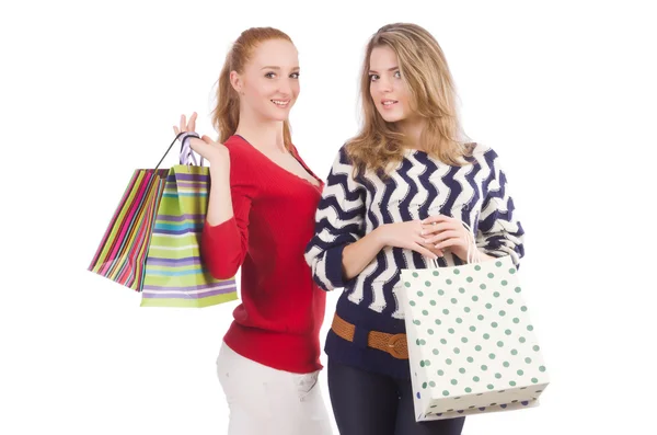 Amigos com sacos de compras isolados em branco — Fotografia de Stock