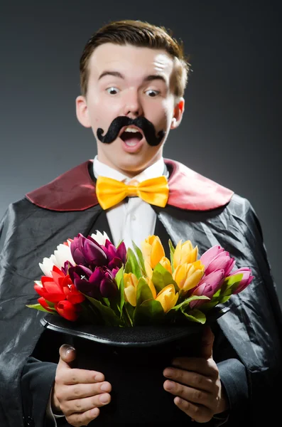 Funny magician with wand and hat — Stock Photo, Image