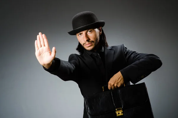 Businessman wearing vintage concept with briefcase — Stock Photo, Image