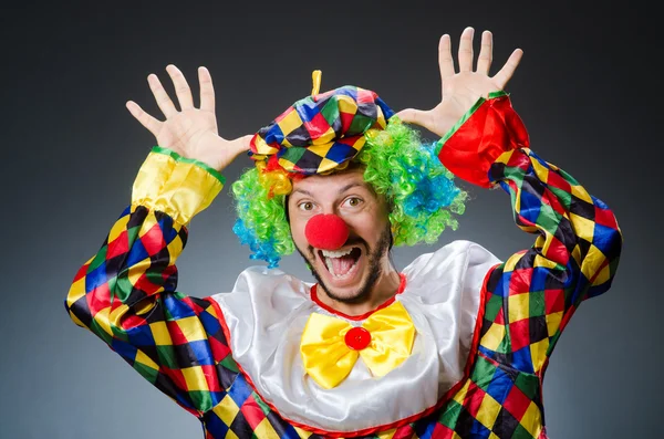 Funny clown in colourful costume — Stock Photo, Image