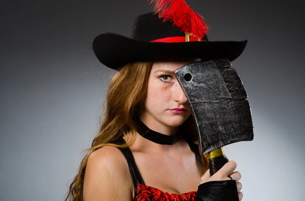 Woman pirate with sharp weapon — Stock Photo, Image