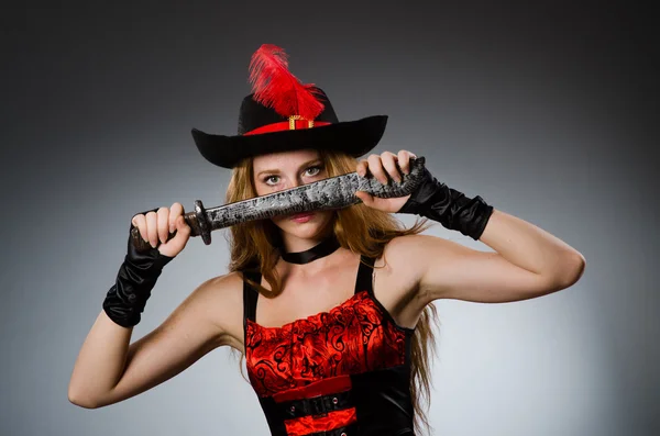 Woman pirate with sharp weapon — Stock Photo, Image