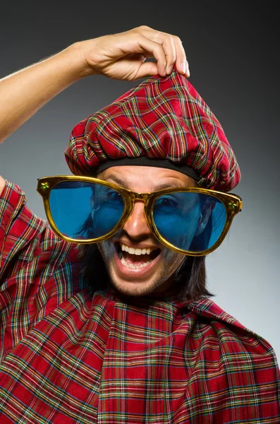 Funny scotsman in traditional clothing — Stock Photo, Image