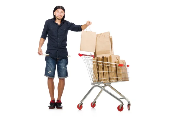 Uomo shopping con carrello supermercato isolato su bianco — Foto Stock