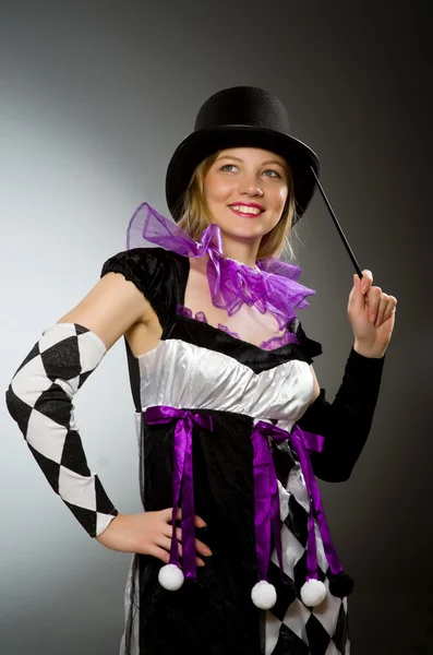 Woman magician doing her tricks with wand — Stock Photo, Image