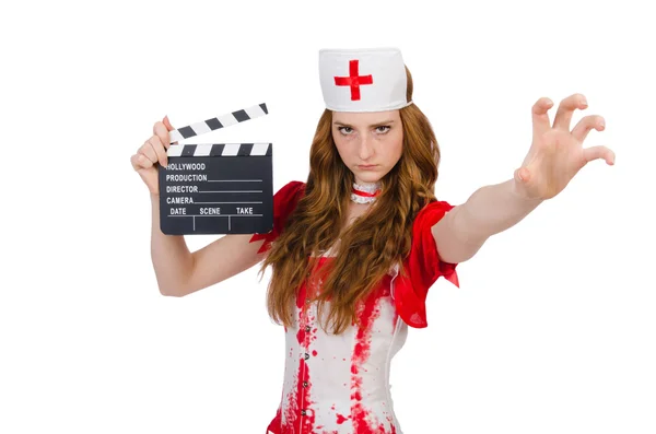 Mujer médico en uniforme sangriento con película clapperboard —  Fotos de Stock