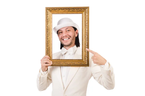 Mężczyzna w białym stroju z ramą obrazu — Zdjęcie stockowe