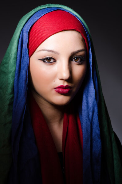 Portrait of the young woman with headscarf