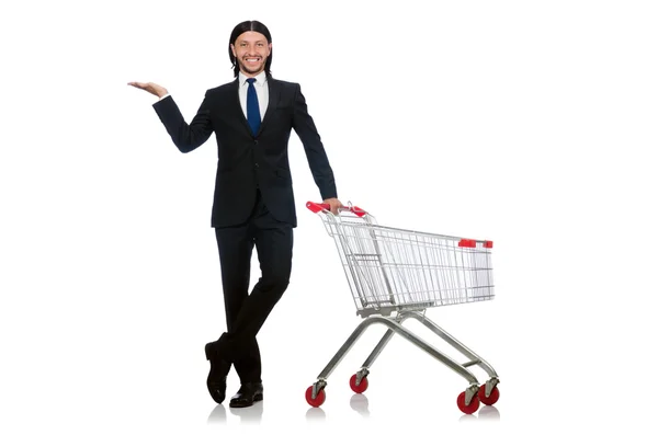 Uomo shopping con carrello supermercato isolato su bianco — Foto Stock