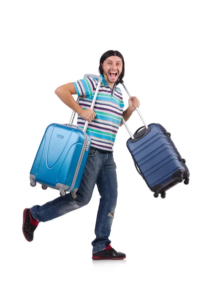 Young man travelling with suitcases isolated on white — Stock Photo, Image