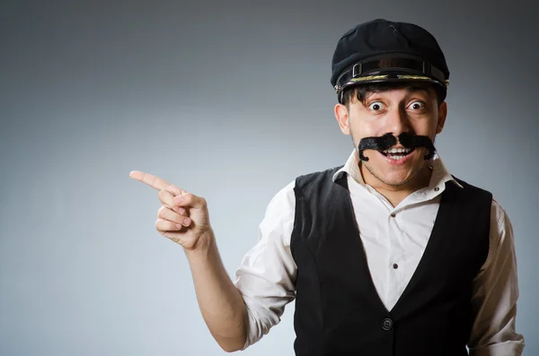 Funny taxi driver wearing peaked cap — Stock Photo, Image