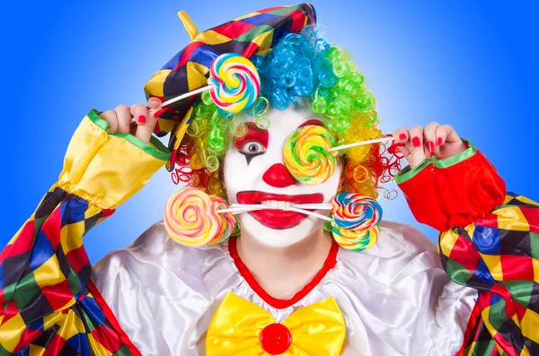 Clown with lollipops — Stock Photo, Image