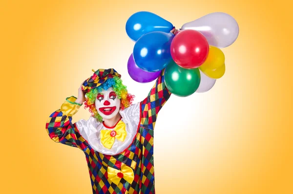 Funny clown with balloons — Stock Photo, Image