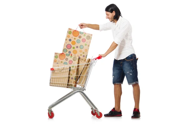 Uomo shopping con carrello supermercato isolato su bianco — Foto Stock