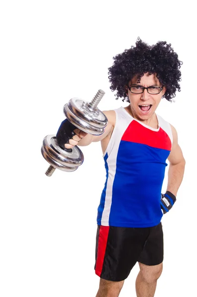 Hombre divertido haciendo ejercicio con pesas — Foto de Stock