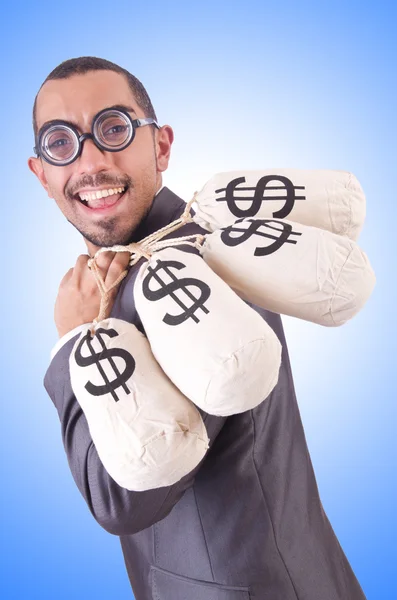 Hombre con sacos de dinero en blanco — Foto de Stock