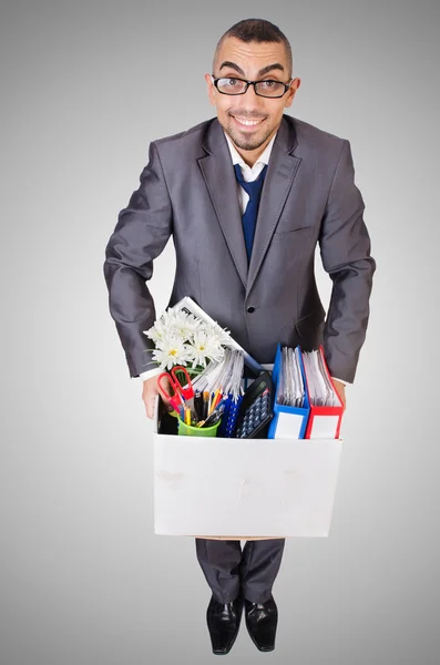 Man being fired with box of personal stuff — Stock Photo, Image