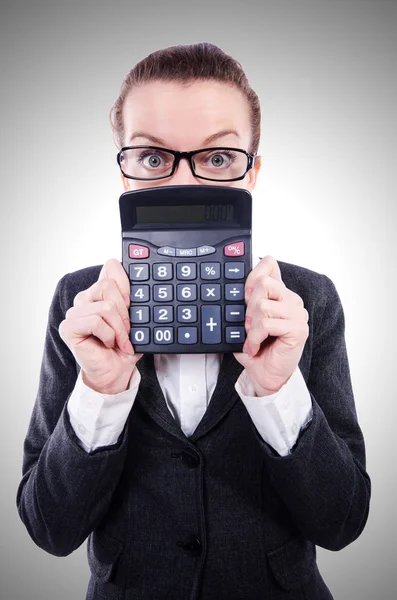 Смешной бухгалтер с калькулятором на белом — стоковое фото