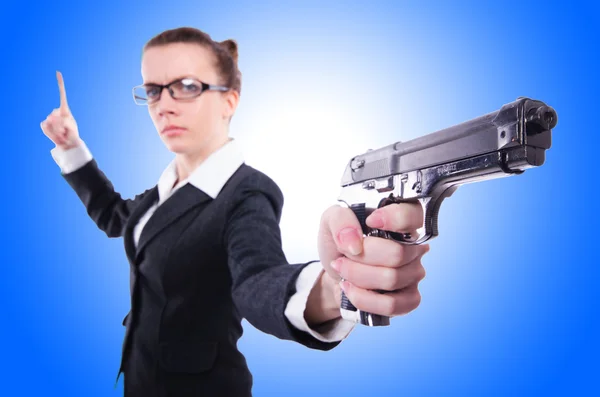 Woman with gun isolated on white — Stock Photo, Image