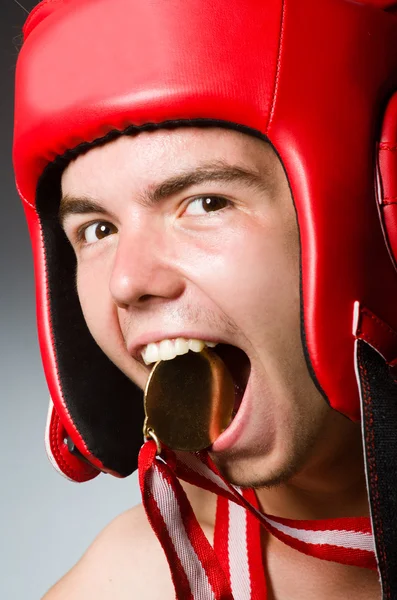 Funny boxer with winning gold medal — Stock Photo, Image