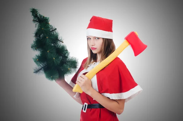 Jovem mulher no vermelho santa traje no branco — Fotografia de Stock