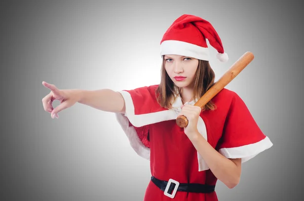 Junge Frau im roten Weihnachtsmannkostüm auf weißem Grund — Stockfoto