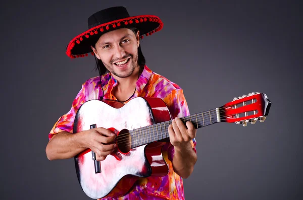 Man wearing sombrero with guitar — Stock Photo, Image
