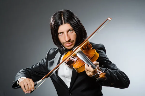 Uomo violinista nel concetto musicano — Foto Stock