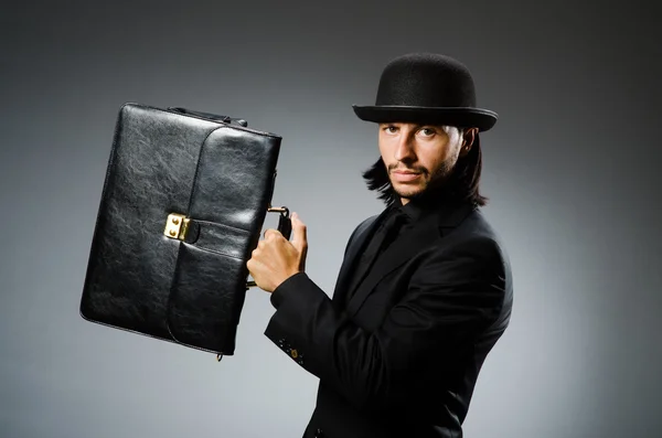 Businessman wearing vintage concept with briefcase — Stock Photo, Image